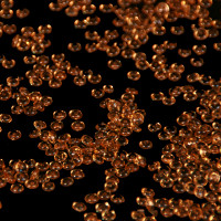 Dekosteine-Tautropfen karamell glänzend ca.Ø 4mm x 5mm pro Tropfen ca.1000 Tropfen. Als Streudeko oder Bastelgranulat